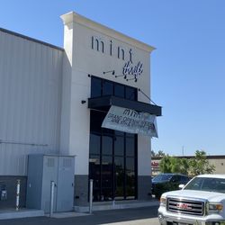 Mint Thrift - Front of store. Plenty of parking in the lot and to the left of the location