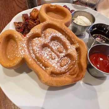 Carnation Cafe - Vegetarian / Mickey-shaped Waffle. Love the shape, but it was so hard, burned, and so very cold. Yuck. - American Near Me - Anaheim, California Carnation Cafe - Vegetarian / Mickey-shaped Waffle. Love the shape, but it was so hard, burned, and so very cold. Yuck. - American Near Me - Anaheim, California