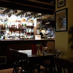 Quarryman's Arms - The bar at Quarryman's Arms is an eclectic collection of bottles and other typical pub items.