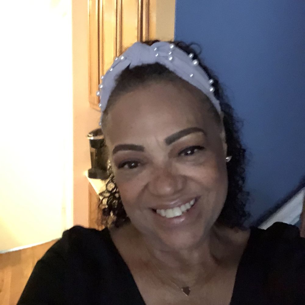 Camilo Market - a smiling woman in a black shirt - Grocery Near Me - Jamaica Plain, Massachusetts Camilo Market - a smiling woman in a black shirt - Grocery Near Me - Jamaica Plain, Massachusetts