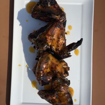 Romeo Meats - grilled meat on a white plate - Meat Shops Near Me - Brooklyn, New York