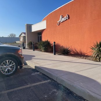 Alma's - a car parked in front of a building - American Near Me - Artesia, New Mexico