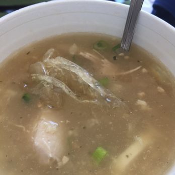 Manila Sunset - Arroz Caldo  served with plastic in the soup - Filipino Near Me - North Hills, California