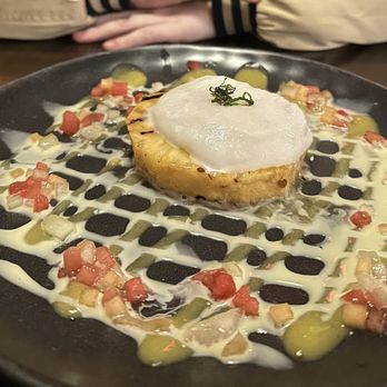 Sage & Salt Bistro - Grilled pineapple with Compressed Melons, Coconut Sorbet, Mango Coulis, Crème Anglaise - New American Near Me - Winston-Salem, North Carolina