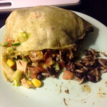 Half-sized burrito explosion on a plate