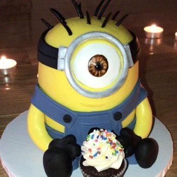 The Cupcake Shoppe - Minion cake. Entire thing is cake and the cupcake in front of it is bite size - Bakeries Near Me - Raleigh, North Carolina The Cupcake Shoppe - Minion cake. Entire thing is cake and the cupcake in front of it is bite size - Bakeries Near Me - Raleigh, North Carolina