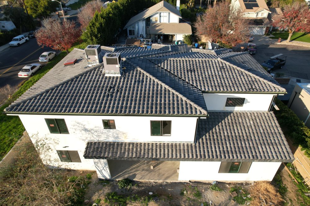 Slide of AJ Reyes Roofing