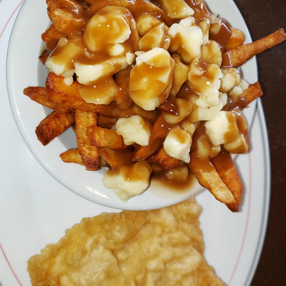 Sir Cedric's Fish & Chips - a plate of food - Seafood Near Me - Windsor, Ontario Sir Cedric's Fish & Chips - a plate of food - Seafood Near Me - Windsor, Ontario