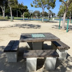 Virginia Avenue Park - Chess tables out in front of the library in the park, near the basketball courts.
