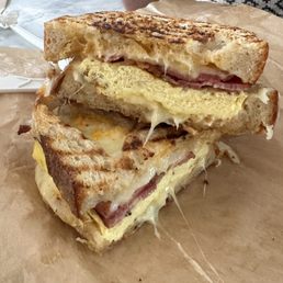 Egg, bacon and cheese sandwich with siracha aioli Egg, bacon and cheese sandwich with siracha aioli