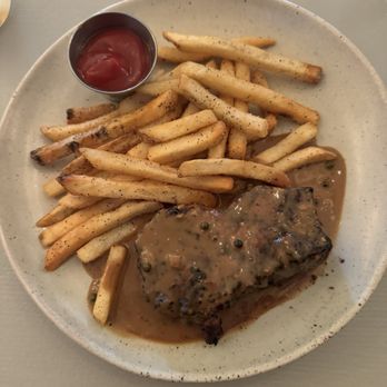 Cohen's Retreat - New York strip au poivre with fries - New American Near Me - Savannah, Georgia Cohen's Retreat - New York strip au poivre with fries - New American Near Me - Savannah, Georgia