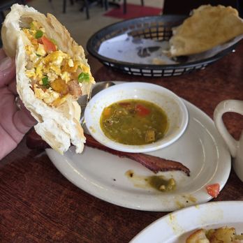 El Comal - Migas in the sopasilla with a good dousing of fresh green chili sauce. - Mexican Near Me - Santa Fe, New Mexico