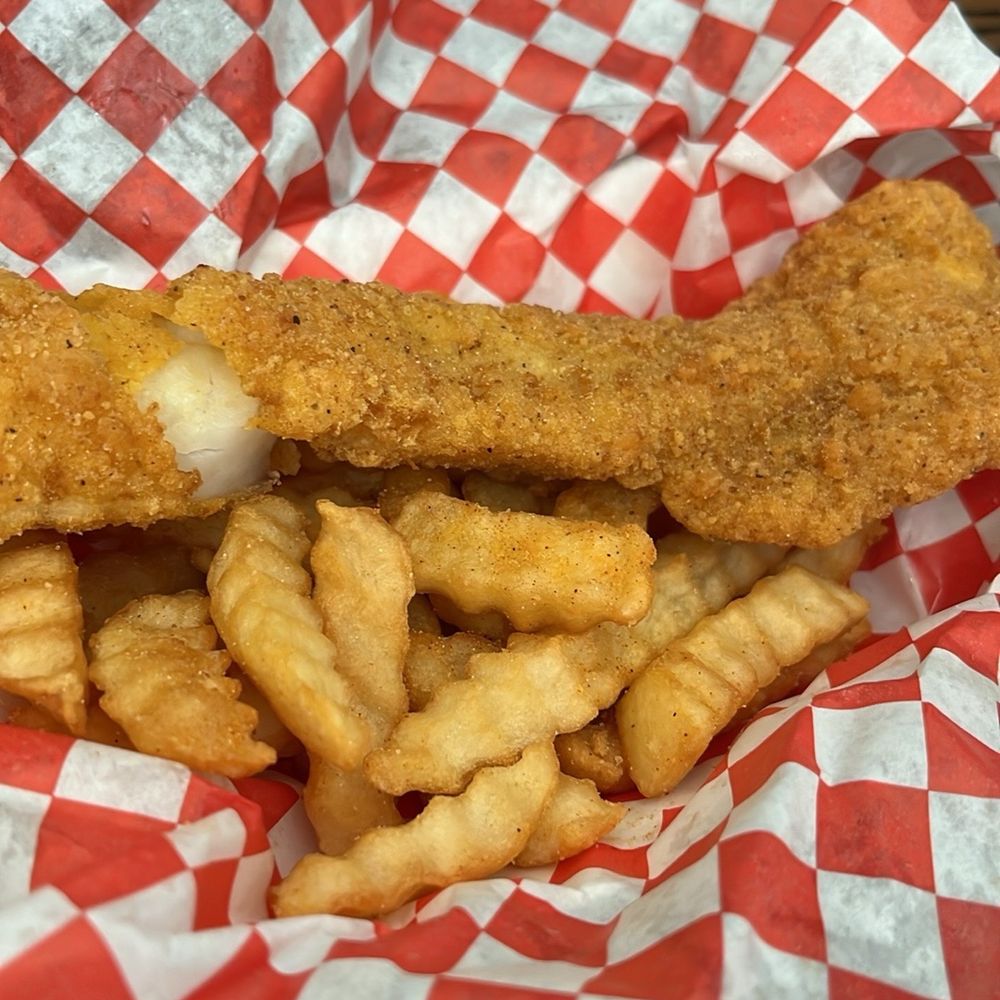 Alaskan whitefish in Cajun light batter and seasoned crinkle fries. Alaskan whitefish in Cajun light batter and seasoned crinkle fries.