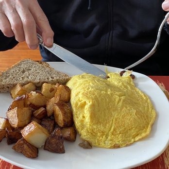 Cafe Heaven - Omelet with home fries and rye toast - Breakfast & Brunch Near Me - Provincetown, Massachusetts Cafe Heaven - Omelet with home fries and rye toast - Breakfast & Brunch Near Me - Provincetown, Massachusetts