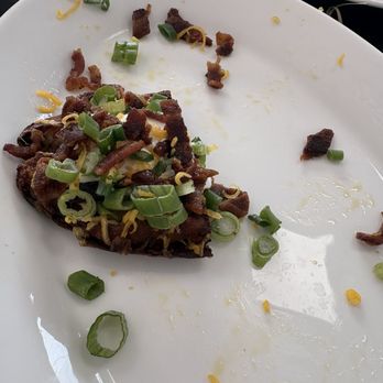 K&K Cafe - Loaded potato skins. There were 6. This is just one. - Comfort Food Near Me - White Settlement, Texas