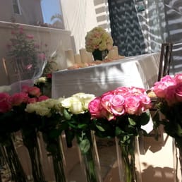 Everlyn helped me with a last-minute surprise: 30 long-stem roses w/ cylinder vases, flower petals, and centerpiece arrangement. Everlyn helped me with a last-minute surprise: 30 long-stem roses w/ cylinder vases, flower petals, and centerpiece arrangement.