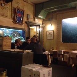 L' Acciuga - The entrance with fish