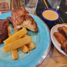 1/2 Chicken with yuca frita and sweet plantains