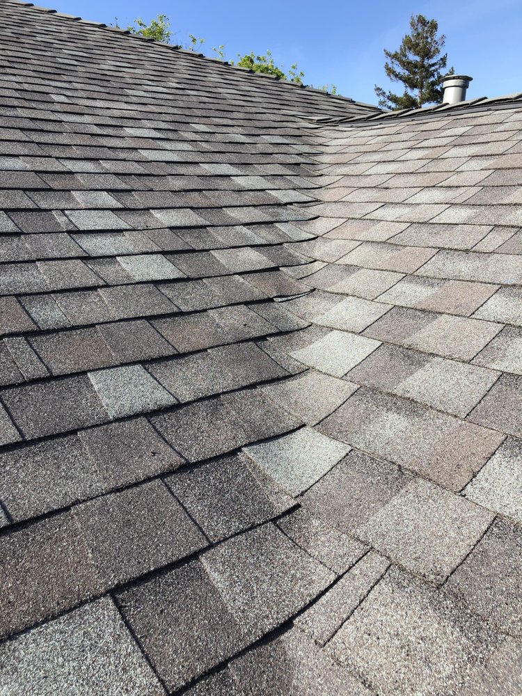 Slide of Nick’s Roofing