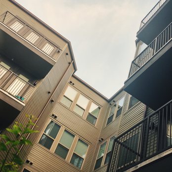 West Koenig Flats Apartment Homes - Looking up from the garden - Apartments Near Me - Austin, Texas West Koenig Flats Apartment Homes - Looking up from the garden - Apartments Near Me - Austin, Texas