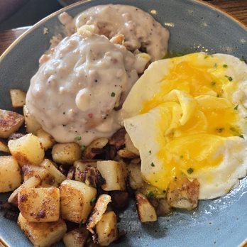 First Watch - Biscuits and gravy plate, with turkey gravy potatoes and eggs - Breakfast & Brunch Near Me - Glendale, Arizona