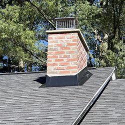 Central Mass Roof Restorations - Custom made metal wrap around chimney.