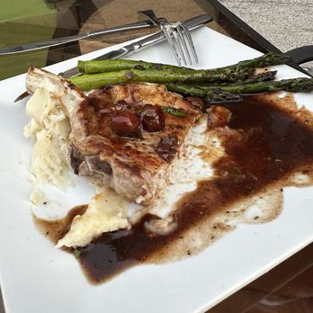 The Mystic Kitchen & Tasting Room - Brown Sugar Brined Pork Chop - Cocktail Bars Near Me - Bloomington, Illinois