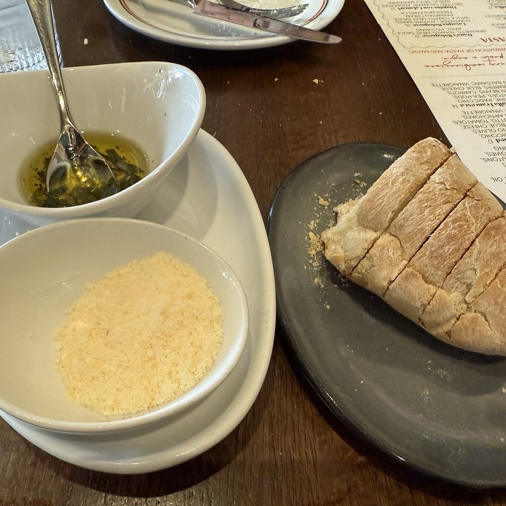 Mio Modo - Complimentary bread with olive oil and cheese - Italian Near Me - St. Charles, Illinois Mio Modo - Complimentary bread with olive oil and cheese - Italian Near Me - St. Charles, Illinois