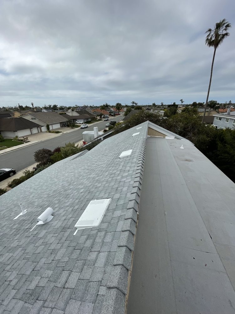 Slide of Baiza's Roofing