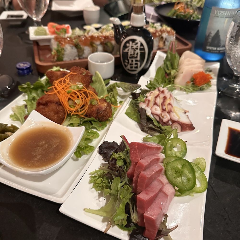 Escolar, octopus, hamachi, pork skewers, spicy tuna roll