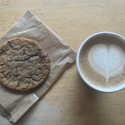 caramel chocolate chip cookie and hot oatmilk Caffè Latte caramel chocolate chip cookie and hot oatmilk Caffè Latte