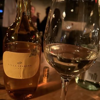 La Rocca Osteria - a glass of wine and a bottle of wine - Italian Near Me - Montclair, New Jersey La Rocca Osteria - a glass of wine and a bottle of wine - Italian Near Me - Montclair, New Jersey