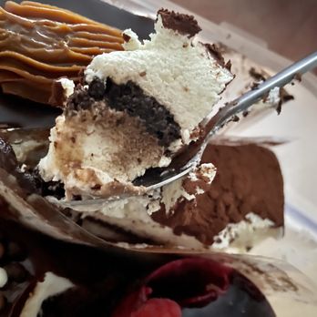 Oasis Cafe - Cross-section of Tiramisu Cheesecake - Bakeries Near Me - New York, New York Oasis Cafe - Cross-section of Tiramisu Cheesecake - Bakeries Near Me - New York, New York