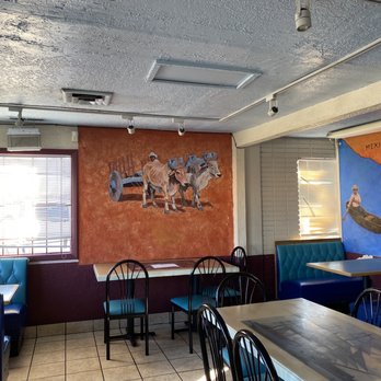 Red Enchilada - a dining area with blue booths - Mexican Near Me - Santa Fe, New Mexico
