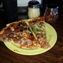 Village Inn Pizza - Fresh and hot, the lunch buffet allows guests to try these classic thin crunchy old school pizza pies.