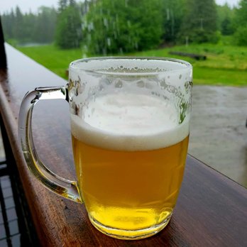 Hill Farmstead Brewery - a smooth, delicious helles ou on the porch, watching the rain pour - Breweries Near Me - Greensboro, Vermont
