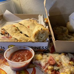 Garlic knots, veggie calzone with marinara sauces. Hawaiian pizza all with Daiya vegan cheese Garlic knots, veggie calzone with marinara sauces. Hawaiian pizza all with Daiya vegan cheese