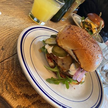 Duke's Grocery - Brunchie burger and wagyu burger in the back - Pubs Near Me - Washington, DC, District of Columbia