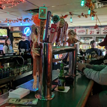 Darby O'Gill's - a woman sitting at a bar - Dive Bars Near Me - Levittown, Pennsylvania Darby O'Gill's - a woman sitting at a bar - Dive Bars Near Me - Levittown, Pennsylvania