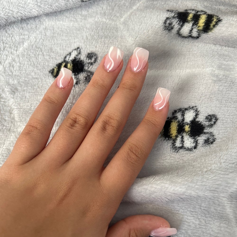 my nails look like shovels. they get wider as they go up. the nail tech also cut me 4 times. my nails look like shovels. they get wider as they go up. the nail tech also cut me 4 times.