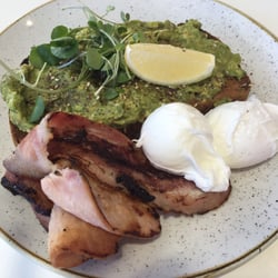 Ramekins Cafe - Smashed avo with poached eggs and bacon added