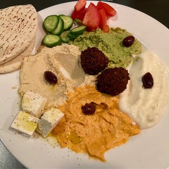Pita Jungle - Mediterranean Antipasto Platter: Hummus, Cilantro Jalapeno Hummus, Roasted Bell Pepper Hummus, Garlic Dip, Falafels, and Feta - Mediterranean Near Me - Flagstaff, Arizona Pita Jungle - Mediterranean Antipasto Platter: Hummus, Cilantro Jalapeno Hummus, Roasted Bell Pepper Hummus, Garlic Dip, Falafels, and Feta - Mediterranean Near Me - Flagstaff, Arizona