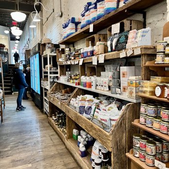 Bread Furst - shelves of food in a store - Bakeries Near Me - Washington, DC, District of Columbia