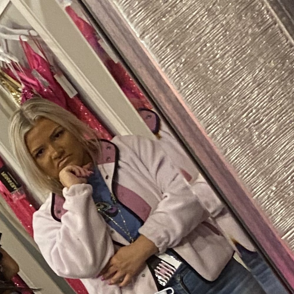 To go with my review of a judgy worker. This is a picture of her looking at me while I was trying on a dress. To go with my review of a judgy worker. This is a picture of her looking at me while I was trying on a dress.