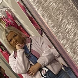 To go with my review of a judgy worker. This is a picture of her looking at me while I was trying on a dress. To go with my review of a judgy worker. This is a picture of her looking at me while I was trying on a dress.