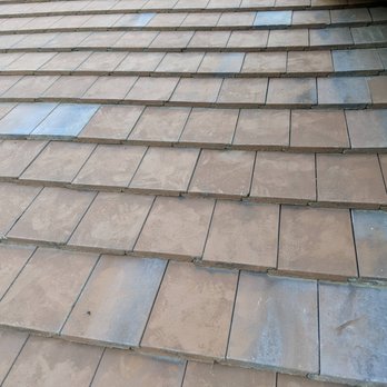 Colin Roofing - The roof was a consistent color before we hired this company. But this was the end result, mismatched replacement tiles. - Roofing Near Me - Palmdale, California Colin Roofing - The roof was a consistent color before we hired this company. But this was the end result, mismatched replacement tiles. - Roofing Near Me - Palmdale, California