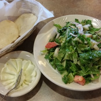 Le Kabob - House salad and the bread with the famous garlic spread. Bomb. - Mediterranean Near Me - Grand Rapids, Michigan Le Kabob - House salad and the bread with the famous garlic spread. Bomb. - Mediterranean Near Me - Grand Rapids, Michigan
