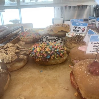 Baker’s Dozen Donuts - Riverside - There's a huge 'Homer Simpson ' donut in orange the photo isn't doing it justice . - Donuts Near Me - Riverside, California