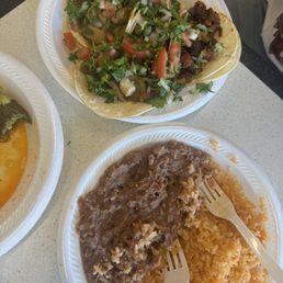 al pastor and chicharron tacos, rice and beans