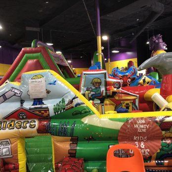 Monkey Joe's - Westheimer - Bouncy football And giant slide in the background - Party & Event Planning Near Me - Houston, Texas Monkey Joe's - Westheimer - Bouncy football And giant slide in the background - Party & Event Planning Near Me - Houston, Texas